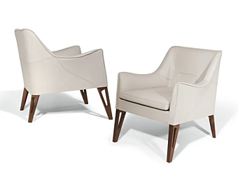 Poltrona in pelle con braccioli Mobius GIORGETTI